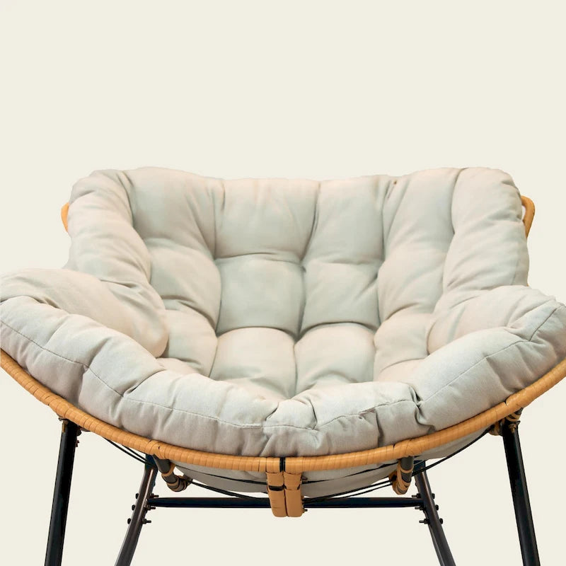 Fauteuil à bascule en rotin tressé gris foncé avec coussins et structure en métal