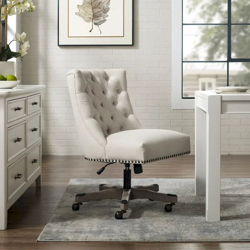 Chaise de bureau beige capitonnée sans accoudoirs avec base pivotante
