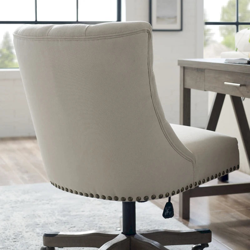 Chaise de bureau beige capitonnée sans accoudoirs avec base pivotante