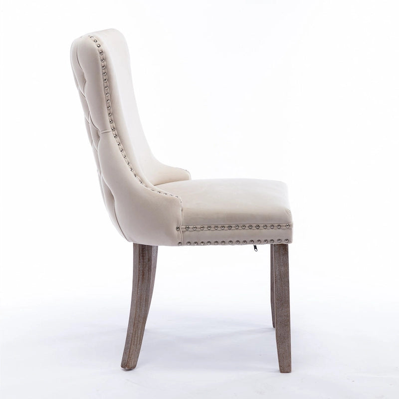 Chaise de salle à manger capitonnée en velours avec dossier à oreilles et clous décoratifs