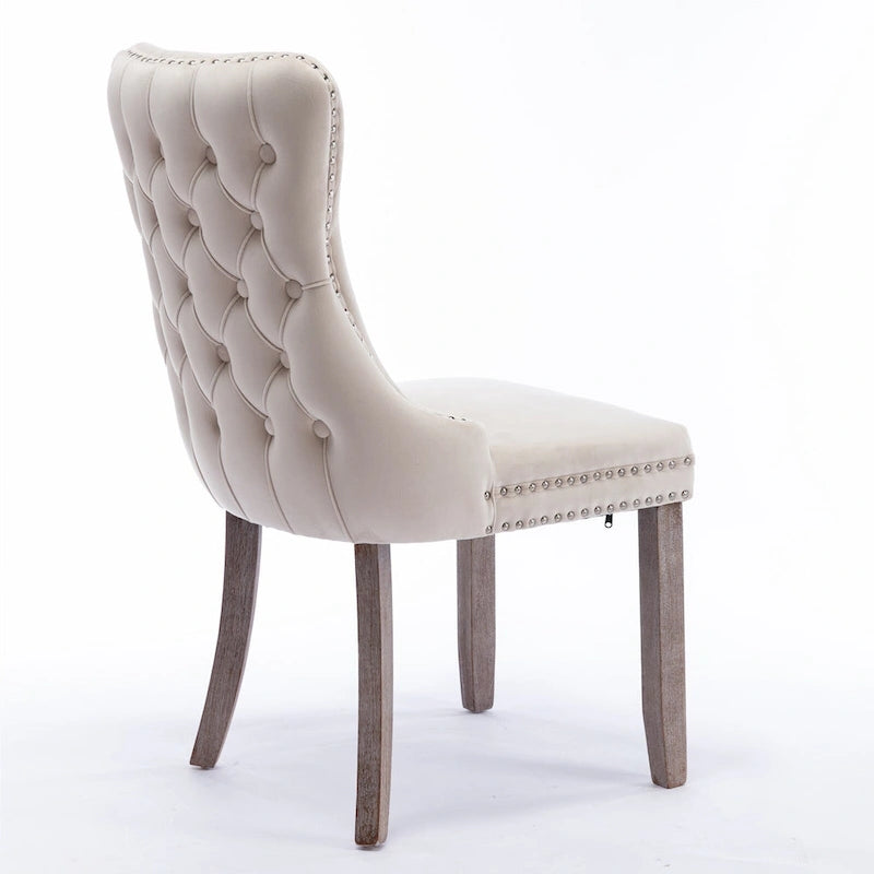 Chaise de salle à manger capitonnée en velours avec dossier à oreilles et clous décoratifs