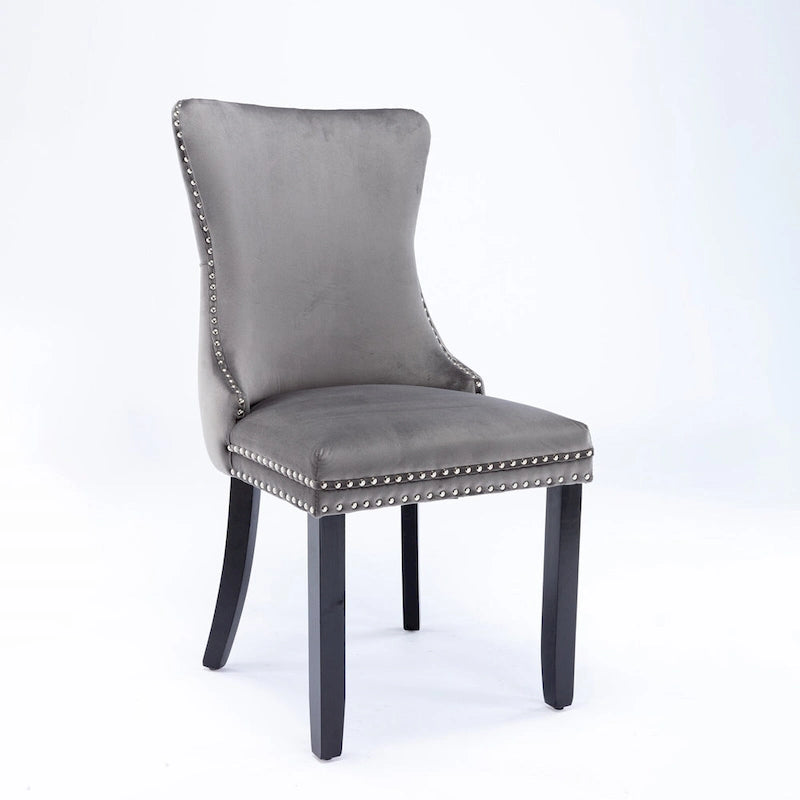 Chaise de salle à manger capitonnée en velours avec dossier à oreilles et clous décoratifs