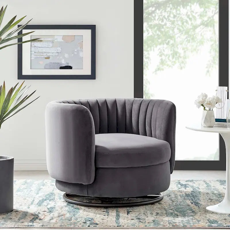 Fauteuil pivotant en velours capitonné avec dossier cannelé et base en métal noir