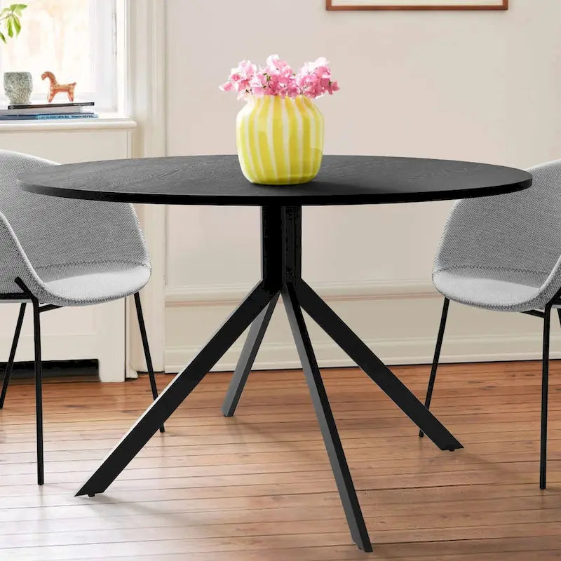 Table à manger ronde noire avec plateau effet chêne et piétement en métal
