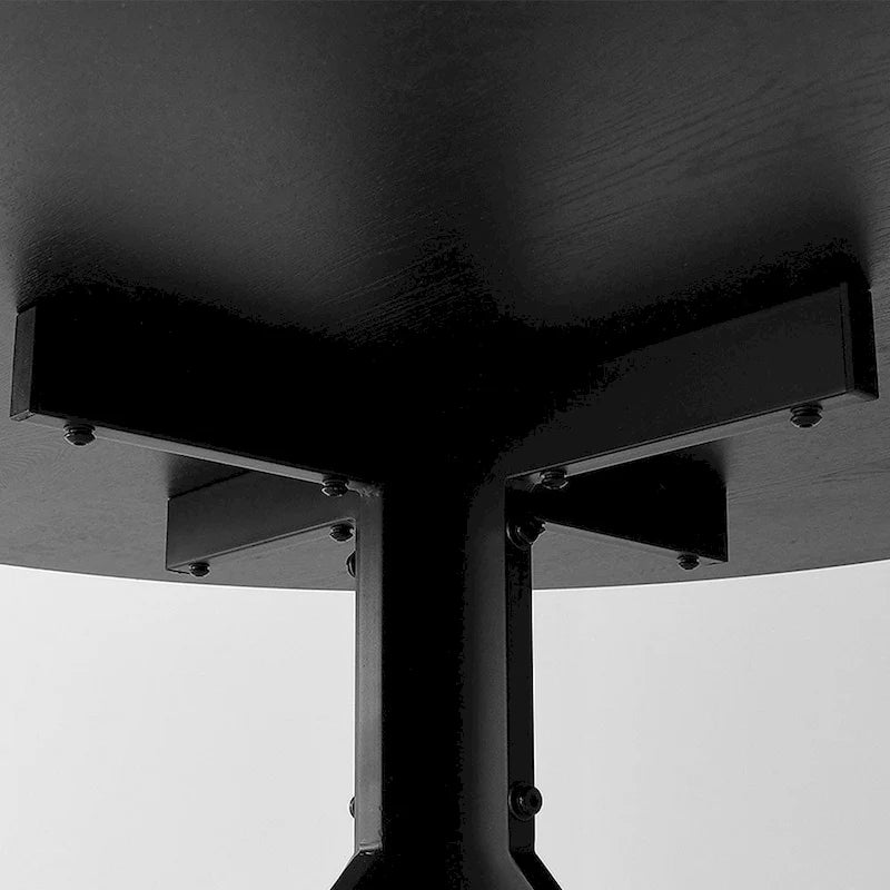 Table à manger ronde noire avec plateau effet chêne et piétement en métal
