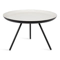 Table basse ronde en métal avec pieds trépied et finition émail bicolore blanc et noir