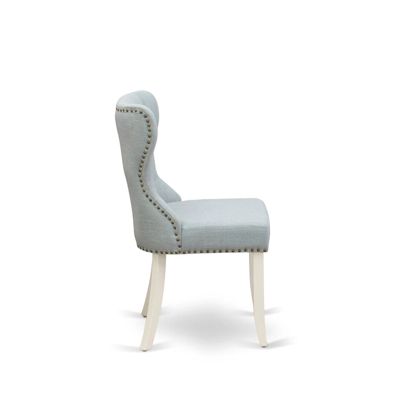 Table à manger ronde en bois avec chaises Parsons tapissées de lin bleu layette Blanc