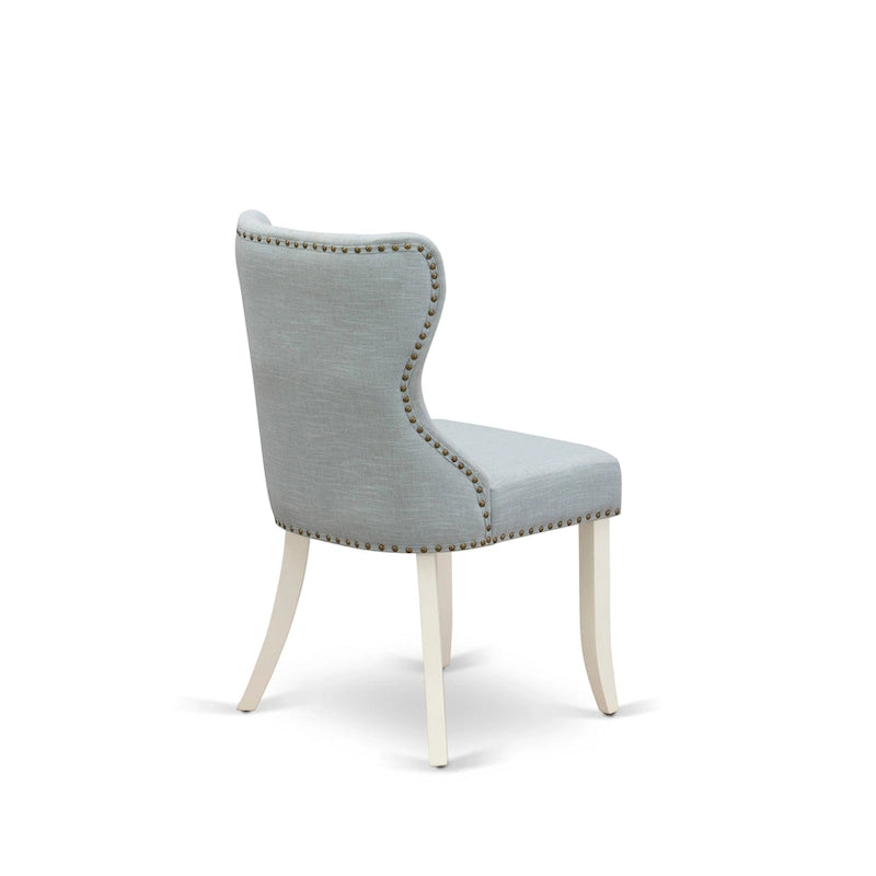 Table à manger ronde en bois avec chaises Parsons tapissées de lin bleu layette Blanc
