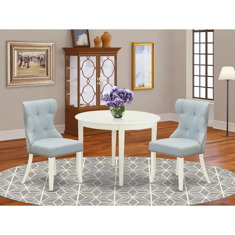 Table à manger ronde en bois avec chaises Parsons tapissées de lin bleu layette Blanc