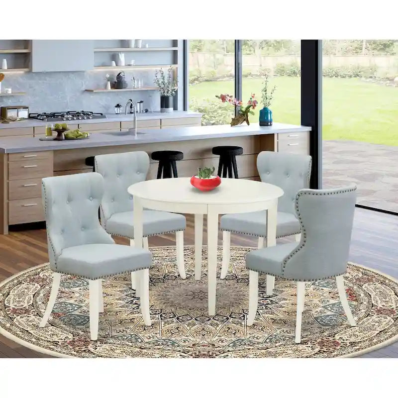 Table à manger ronde en bois avec chaises Parsons tapissées de lin bleu layette Blanc